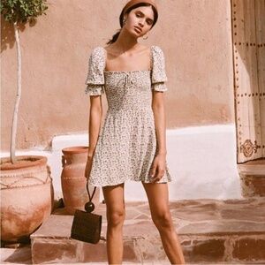 Faithfull The Brand Beldhi Floral Smocked Mini Dress